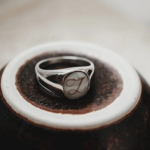 Entity Proud silver mother's milk or baby hair ring