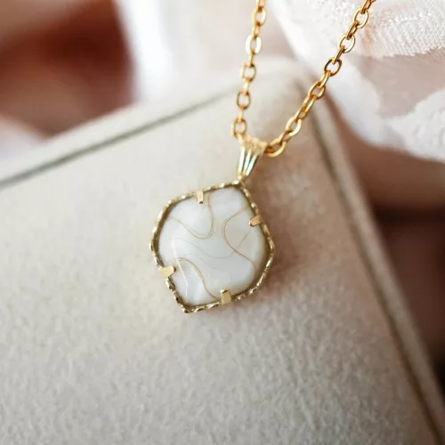 Peakem szilvamag medál - 14k arany medál 15mm 